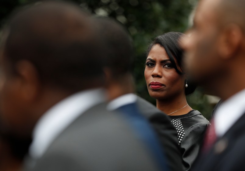 White House Director of communications for the Office of Public Liaison Omarosa Manigault stands with the of leaders of Historically Black Colleges and Universities (HBCU) outside the West Wing of the White House in Washington, Tuesday, Feb. 28, 2017. President Donald Trump signed an executive order Tuesday aimed at signaling his commitment to historically black colleges and universities, saying that those schools will be "an absolute priority for this White House."(AP Photo/Pablo Martinez Monsivais)