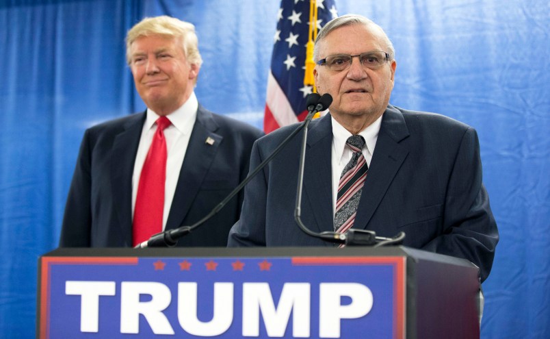 FILE - In this Jan. 26, 2016, file photo, then-Republican presidential candidate Donald Trump is joined by Joe Arpaio, the then sheriff of metro Phoenix, during a news conference in Marshalltown, Iowa. The former Phoenix-area sheriff who was pardoned by President Donald Trump from his federal contempt-of-court conviction in an immigration case is experiencing a wobbly return to the public speaking circuit.In Las Vegas, security concerns prompted event planners to move Arpaio’s scheduled weekend appearance to an undisclosed location away from the casino-lined Strip tourist district. (AP Photo/Mary Altaffer, File)