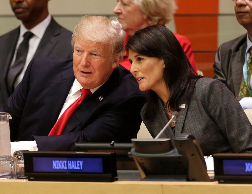 United States President Donald Trump speaks with U.S. Ambassador to the United Nations Nikki Haley before a meeting during the 72st session of the United Nations General Assembly at U.N. headquarters, Monday, Sept. 18, 2017. (AP Photo/Seth Wenig)