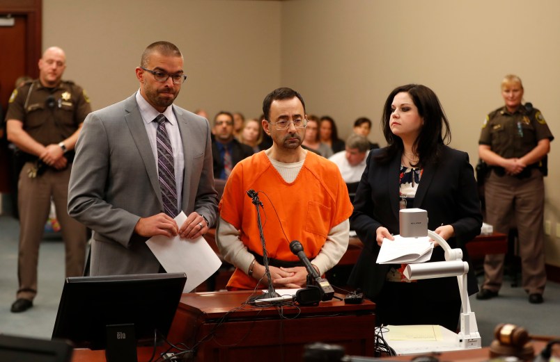 Dr. Larry Nassar, 54, appears in court for a plea hearing in Lansing, Mich., Wednesday, Nov. 22, 2017. Nasser, a sports doctor accused of molesting girls while working for USA Gymnastics and Michigan State University pleaded, guilty to multiple charges of sexual assault and will face at least 25 years in prison.(AP Photo/Paul Sancya)