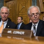 Senate Budget Committee members Sen. Bob Corker, R-Tenn., right, and Sen. Ron Johnson, R-Wis., left  attend a Senate Budget Committee hearing to consider fiscal year 2018 reconciliation legislation on Capitol Hill in Washington, Tuesday, Nov. 28, 2017. The Senate Budget Committee has advanced a sweeping tax package to the full Senate, handing GOP leaders a victory as they try to pass the nation's first tax overhaul in 31 years. (AP Photo/Carolyn Kaster)