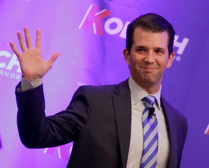 Donald Trump Jr. waves to the audience during a fundraiser for Kansas Secretary of State Kris Kobach's campaign for governor Tuesday, Nov. 28, 2017, in Overland Park, Kan. (AP Photo/Charlie Riedel)