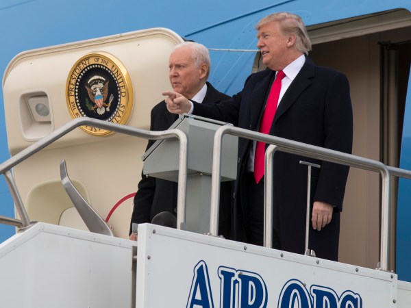 President Donald Trump stands with Sen. Orrin Hatch, R-Utah, after arriving at Salt Lake City International Airport, Monday, Dec. 4, 2017, in Salt Lake City. (AP Photo/Evan Vucci)
