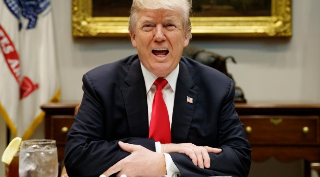 President Donald Trump speaks before a hosting a lunch with Senate Republicans in the Roosevelt Room of the White House, Tuesday, Dec. 5, 2017, in Washington. (AP Photo/Evan Vucci)