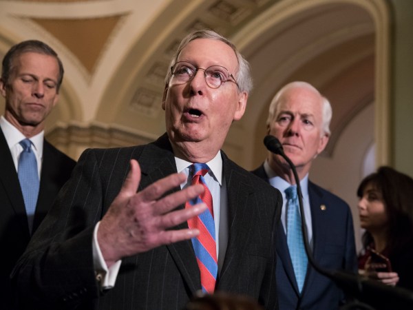 With the deadline looming to pass a spending bill to fund the government by week's end, Senate Majority Leader Mitch McConnell, R-Ky., joined by, from left, Sen. Roy Blunt, R-Mo., Sen. John Thune, R-S.D., and Majority Whip John Cornyn, R-Texas, meets reporters following a closed-door strategy session, on Capitol Hill in Washington, Tuesday, Dec. 5, 2017.  (AP Photo/J. Scott Applewhite)