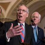 With the deadline looming to pass a spending bill to fund the government by week's end, Senate Majority Leader Mitch McConnell, R-Ky., joined by, from left, Sen. Roy Blunt, R-Mo., Sen. John Thune, R-S.D., and Majority Whip John Cornyn, R-Texas, meets reporters following a closed-door strategy session, on Capitol Hill in Washington, Tuesday, Dec. 5, 2017.  (AP Photo/J. Scott Applewhite)
