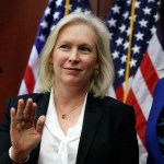 Sen. Kirsten Gillibrand, D-N.Y., left, tells reporters to wait until the end to ask questions about her statement on Sen. Al Franken, D-Minn., while attending a news conference on sexual harassment in the workplace, Wednesday, Dec. 6, 2017, on Capitol Hill in Washington. At right is Rep. Cheri Bustos, D-Illinois. (AP Photo/Jacquelyn Martin)