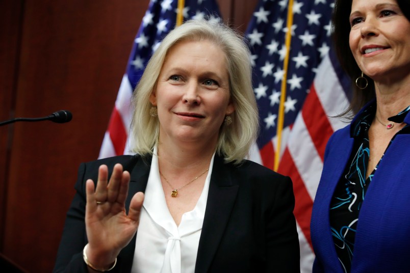Sen. Kirsten Gillibrand, D-N.Y., left, tells reporters to wait until the end to ask questions about her statement on Sen. Al Franken, D-Minn., while attending a news conference on sexual harassment in the workplace, Wednesday, Dec. 6, 2017, on Capitol Hill in Washington. At right is Rep. Cheri Bustos, D-Illinois. (AP Photo/Jacquelyn Martin)