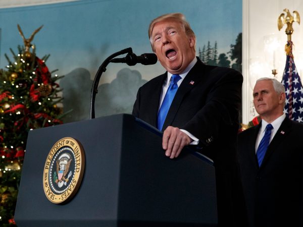 Vice President Mike Pence listens as President Donald Trump delivers a statement to officially recognize Jerusalem as the capital of Israel, in the Diplomatic Reception Room of the White House, Wednesday, Dec. 6, 2017, in Washington. (AP Photo/Evan Vucci)