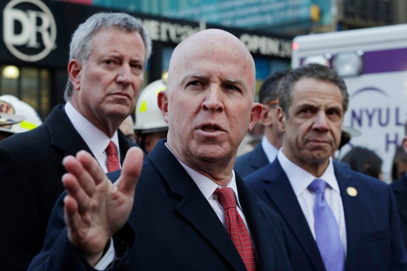 New York City Police Commissioner James O'Neill holds a news conference outside the Port Authority Bus Terminal with Mayor Bill de Blasio, left, and Gov. Andrew Cuomo, Monday, Dec. 11, 2017, in New York. A pipe bomb strapped to a man went off in the New York City subway near Times Square on Monday, injuring the suspect and another person at the height of the morning rush hour, law enforcement officials said. (AP Photo/Mark Lennihan)