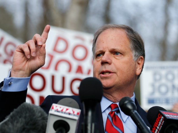 Democratic candidate for U.S. Senate Doug Jones speaks to reporters after casting his ballot Tuesday, Dec. 12, 2017, in Mountain Brook , Ala. Jones is facing Republican Roy Moore. (AP Photo/John Bazemore)