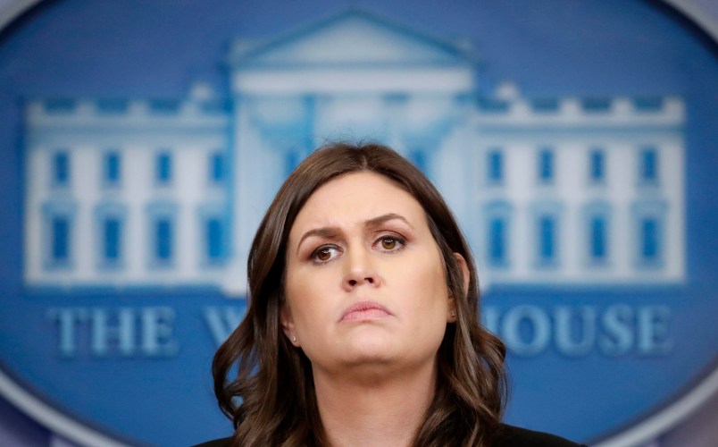 White House press secretary Sarah Huckabee Sanders listens to a reporter's question during a press briefing at the White House, Tuesday, Dec. 12, 2017, in Washington. (AP Photo/Alex Brandon)