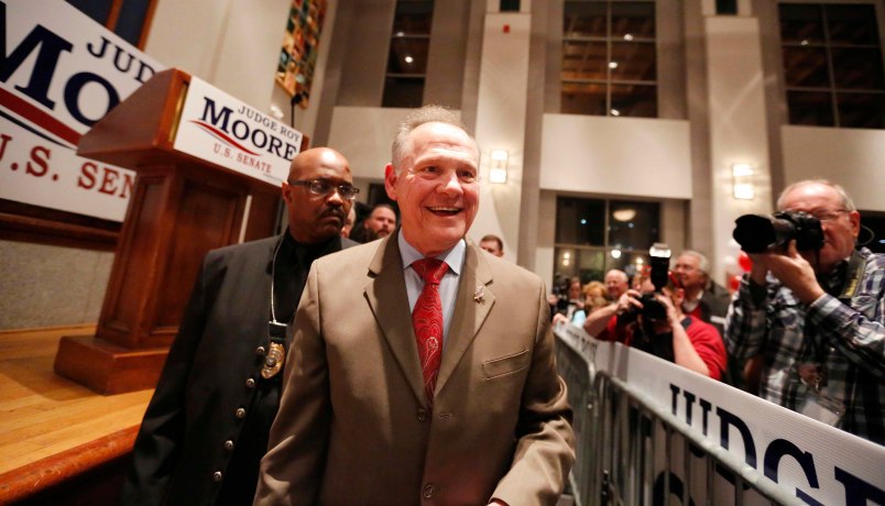 U.S. Senate candidate Roy Moore greets supporters during an election-night watch party at the RSA activity center, Tuesday, Dec. 12, 2017, in Montgomery, Ala. (AP Photo/Brynn Anderson)