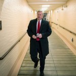 Rep. Mark Meadows, R-N.C., chairman of the conservative Freedom Caucus, arrives for a closed-door strategy session with House Republicans as the deadline looms to pass a spending bill to fund the government by week's end, on Capitol Hill in Washington, Tuesday, Dec. 5, 2017.  (AP Photo/J. Scott Applewhite)