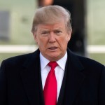 President Donald Trump boards Air Force One for a trip to Salt Lake City, Monday, Dec. 4, 2017, in Andrews Air Force Base, Md. (AP Photo/Evan Vucci)