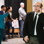 PORTLAND, ME - NOVEMBER 8: Maine Secretary of State Matthew Dunlap fields a phone call during one of several election day stops, to see how the polling process is going, at the Merrill Auditorioun Rehearsal Hall voting location in Portland on Tuesday, November 8, 2016. (Photo by Carl D. Walsh/Staff Photographer)