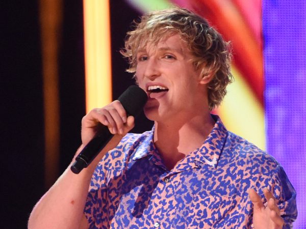 Logan Paul introduces a performance by Kyle & Lil Yachty and Rita Ora at the Teen Choice Awards at the Galen Center on Sunday, Aug. 13, 2017, in Los Angeles. (Photo by Phil McCarten/Invision/AP)