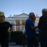 The U.S. flag is seen lowered to half staff above the White House in Washington, Monday, Oct. 2, 2017. President Donald Trump ordered that flags be lowered at all government buildings to honor the victims of a mass shooting in the Las Vegas attacks. (AP Photo/Pablo Martinez Monsivais)