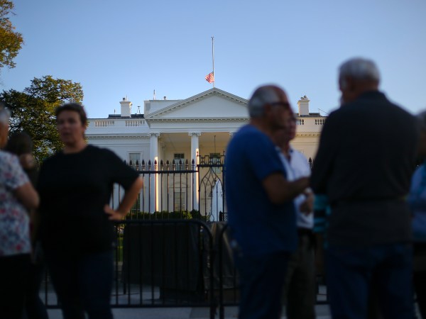 The U.S. flag is seen lowered to half staff above the White House in Washington, Monday, Oct. 2, 2017. President Donald Trump ordered that flags be lowered at all government buildings to honor the victims of a mass shooting in the Las Vegas attacks. (AP Photo/Pablo Martinez Monsivais)