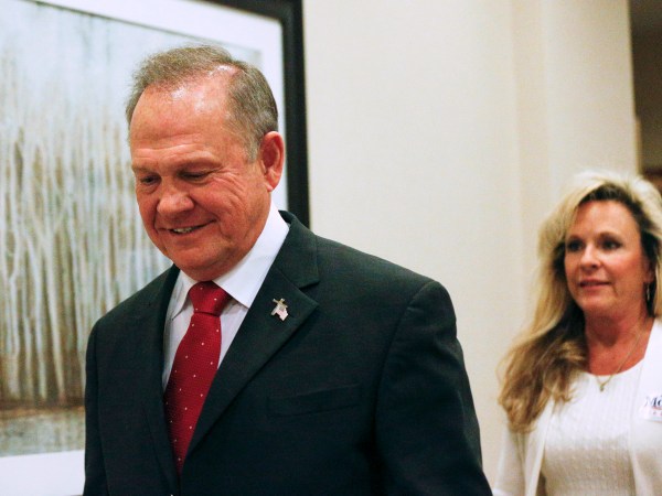 Former Alabama Chief Justice and U.S. Senate candidate Roy Moore walks in to speak at a press conference, Thursday, Nov. 16, 2017, in Birmingham, Ala. (AP Photo/Brynn Anderson)
