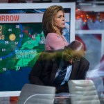 Anchor Hoda Kotb, with co-anchor Al Roker, lower center, stands on the set of the Today Show between segments Wednesday, Nov. 29, 2017, in New York, in the wake of the firing of ‘Today’ co-anchor Matt Lauer. NBC News fired the longtime host on Wednesday for "inappropriate sexual behavior," making him the second morning television show personality to lose his job because of sexual misconduct charges in a week. (AP Photo/Craig Ruttle)