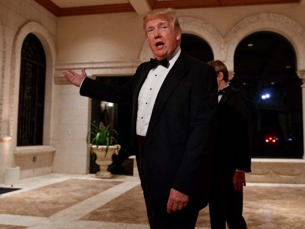 President Donald Trump speaks with reporters as he arrives for a New Year's Eve gala at his Mar-a-Lago resort, Sunday, Dec. 31, 2017, in Palm Beach, Fla. (AP Photo/Evan Vucci)