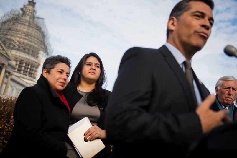 UNITED STATES - DECEMBER 04: From left, Clarissa Martinez-De-Castro of the National Council of La Raza, Lorella Praeli of United We Dream, Chairman of the House Democratic Caucus Rep. Xavier Becerra, D-Calif., House Minority Whip Steny Hoyer, D-Md., attend a news conference at the House Triangle, to call on House Republicans to pass a comprehensive immigration reform bill, December 4, 2014. (Photo By Tom Williams/CQ Roll Call)