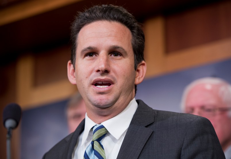 UNITED STATES - JANUARY 14: Sen. Brian Schatz, D-Hawaii, speaks during a news conference in the Capitol to announce the newly formed Senate Climate Change Task Force. (Photo By Tom Williams/CQ Roll Call)