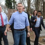 Vice President Mike Pence and Missouri Gov. Eric Greitens walk through the Chesed Shel Emeth Cemetery in University City, Mo., on Wednesday, Feb. 22, 2017. A St. Louis County attorney filed a lawsuit last week accusing Gov. Eric Greitens and his staff of engaging in an ongoing conspiracy to violate Missouri's open records laws by using an app that deletes text messages after they've been read. (J.B. Forbes/St. Louis Post-Dispatch/TNS)