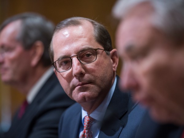 UNITED STATES - JANUARY 09: Tommy Thompson, right, former Health and Human Services secretary, introduces Alex Azar, center, nominee to be HHS secretary, during Azar's Senate Finance Committee confirmation hearing in Dirksen Building on January 9, 2018. Mike Leavitt, former HHS secretary, appears at far left. (Photo By Tom Williams/CQ Roll Call)