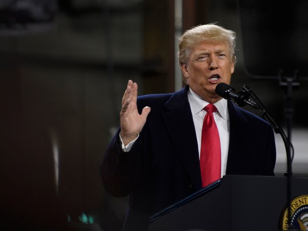 CORAOPOLIS, PA - JANUARY 18: President Donald Trump speaks to supporters at a rally at H&K Equipment, a rental and sales company for specialized material handling solutions on January 18, 2018 in Coraopolis, Pennsylvania. Trump visited the facility for a factory tour and to offer remarks to supporters and employees following the administration's new tax plan. (Photo by Jeff Swensen/Getty Images)
