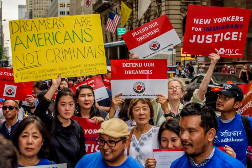 TRUMP TOWER, NEW YORK, UNITED STATES - 2017/10/05: The Asian American Federation partnered with leading immigrant advocacy groups in New York to hold the Asian-American Dreamer rally outside Trump Tower in Manhattan on October 5, 2017; to defend the future of DACA, and in support of Asian-American DACA recipients who are being impacted by the dissolution of the DACA program under the Trump administration. (Photo by Erik McGregor/Pacific Press/LightRocket via Getty Images)