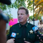 2015 June 23 Broward County Sheriff Scott Israel.  Local activitists in Fort Lauderdale, Florida lead a rally to commemorate the lives of the nine black churchgoers who lost their lives.  With our nation grappling over racist violence., local activist groups include Dream Defenders and People's Opposition to War, Imperialism, and Racism ( or POWIR) came together with members of the community.  Candles were lit and the group walked to a near by church to pray.