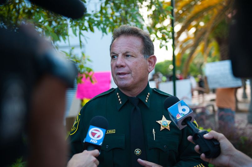 2015 June 23 Broward County Sheriff Scott Israel.  Local activitists in Fort Lauderdale, Florida lead a rally to commemorate the lives of the nine black churchgoers who lost their lives.  With our nation grappling over racist violence., local activist groups include Dream Defenders and People's Opposition to War, Imperialism, and Racism ( or POWIR) came together with members of the community.  Candles were lit and the group walked to a near by church to pray.