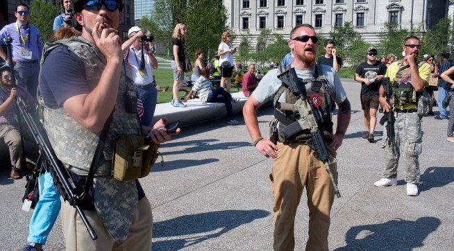 Thousands of members of the media mix with Republican delegates, demonstrators, street preachers, corporate donors,  police from several states, and anyone seeking the glare of the television lights during the Republican Convention in Cleveland Ohio. The Republican Party officially nominated Donald Trump as their candidate for president. Gin rights activists taunt Al Sharpton who is across the street.
