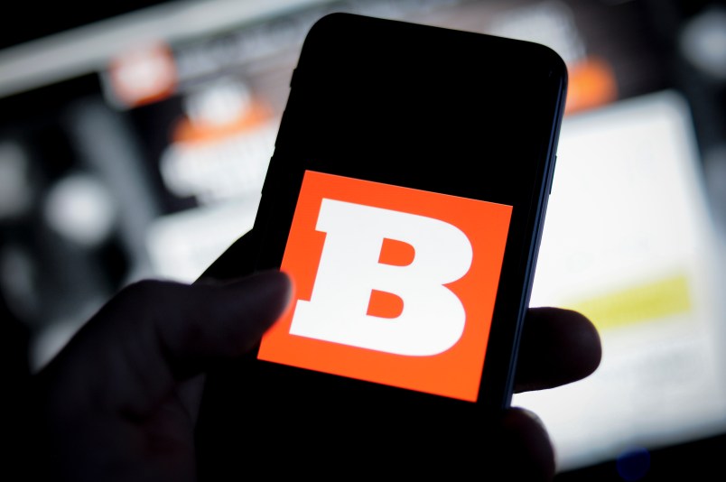 The Breitbart logo is seen on an iPhone with the Breitbart website in the background in this photo illustration on November 20, 2017. (Photo by Jaap Arriens/NurPhoto)