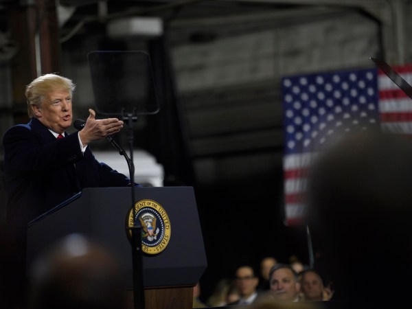 CORAOPOLIS, PA - JANUARY 18: President Donald Trump speaks to supporters at a rally at H&K Equipment, a rental and sales company for specialized material handling solutions on January 18, 2018 in Coraopolis, Pennsylvania. Trump visited the facility for a factory tour and to offer remarks to supporters and employees following the administration's new tax plan. (Photo by Jeff Swensen/Getty Images)