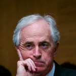 WASHINGTON, DC - JANUARY 30:  Senator Bob Corker (R-TN) looks on as Treasury Secretary Steven Mnuchin delivers the annual financial stability report to the Senate Banking, Housing and Urban Affairs Committee on January 30, 2018 in Washington, DC. Mnuchin said the Treasury can extend the government's debt limit suspension period into February before it exhausts its borrowing ability.  (Photo by Pete Marovich/Getty Images)