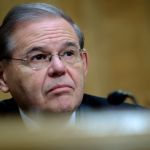 WASHINGTON, DC - JANUARY 30:  Senator Bob Menendez (D-NJ) looks on as Treasury Secretary Steven Mnuchin delivers the annual financial stability report to the Senate Banking, Housing and Urban Affairs Committee on January 30, 2018 in Washington, DC. Mnuchin said the Treasury can extend the government's debt limit suspension period into February before it exhausts its borrowing ability.  (Photo by Pete Marovich/Getty Images)