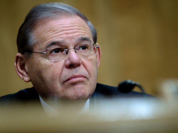WASHINGTON, DC - JANUARY 30:  Senator Bob Menendez (D-NJ) looks on as Treasury Secretary Steven Mnuchin delivers the annual financial stability report to the Senate Banking, Housing and Urban Affairs Committee on January 30, 2018 in Washington, DC. Mnuchin said the Treasury can extend the government's debt limit suspension period into February before it exhausts its borrowing ability.  (Photo by Pete Marovich/Getty Images)