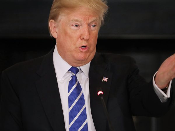 U.S. President Donald Trump conducts a meeting with state and local officials to unveil his administration's long-awaited infrastructure plan in the State Dining Room at the White House February 12, 2018 in Washington, DC. The $1.5 trillion plan to repair and rebuild the nation's crumbling highways, bridges, railroads, airports, seaports and water systems is funded with $200 million in federal money with the remaining 80 percent coming from state and local governments.