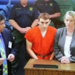 Nikolas Cruz, 19, a former student at Marjory Stoneman Douglas High School in Parkland, Florida, where he allegedly killed 17 people, is seen on a closed circuit television screen during a bond  hearing in front of Broward Judge Kim Mollica at the Broward County Courthouse on February 15, 2018 in Fort Lauderdale, Florida. Mr. Cruz is possibly facing 17 counts of premeditated murder in the school shooting.