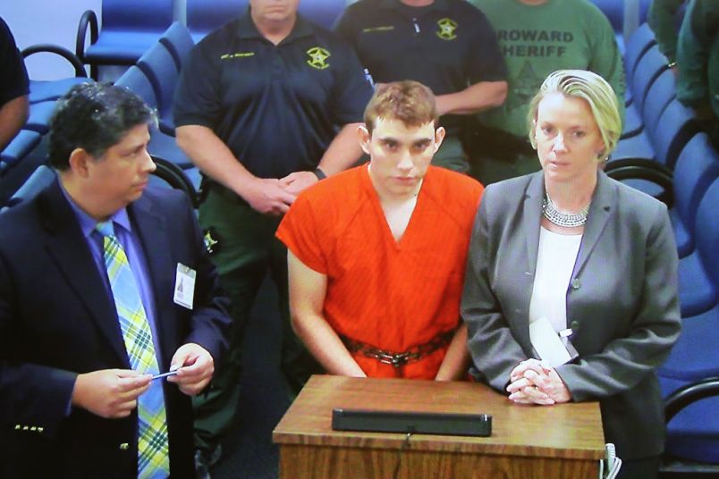 Nikolas Cruz, 19, a former student at Marjory Stoneman Douglas High School in Parkland, Florida, where he allegedly killed 17 people, is seen on a closed circuit television screen during a bond  hearing in front of Broward Judge Kim Mollica at the Broward County Courthouse on February 15, 2018 in Fort Lauderdale, Florida. Mr. Cruz is possibly facing 17 counts of premeditated murder in the school shooting.