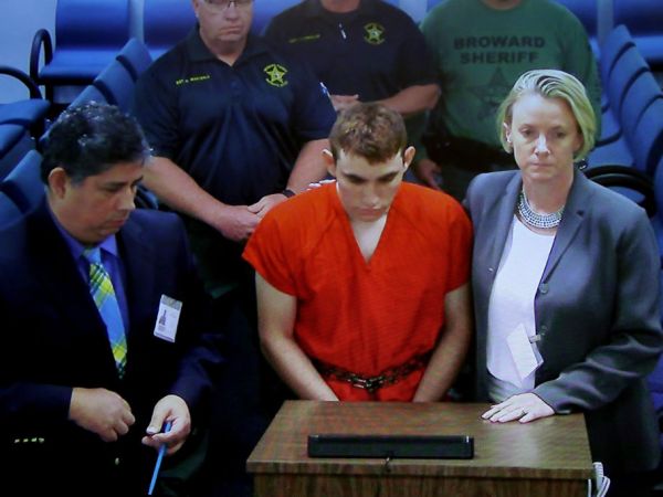 Suspected school shooter Nikolas Cruz makes a video appearance in Broward County court before Judge Kim Theresa Mollica on Thursday, Feb. 15, 2018. Cruz is facing 17 charges of premeditated murder in the mass shooting at Marjory Stoneman Douglas High School in Parkland, Fla. (Susan Stocker/Sun Sentinel/TNS)