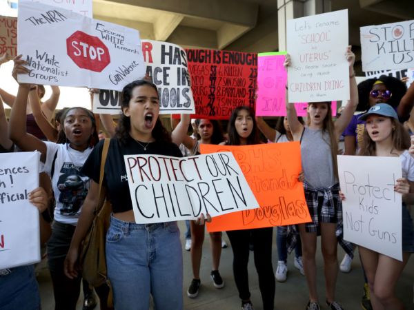 Victoria Mejiar, a sophomore at South Broward High School attends a rally at the Federal Courthouse in Fort Lauderdale, Fla., to demand government action on firearms, on Saturday, Feb. 17, 2018. Their call to action is a response the massacre at Marjory Stoneman Douglas High School in Parkland, Fla. (Mike Stocker/Sun Sentinel/TNS)