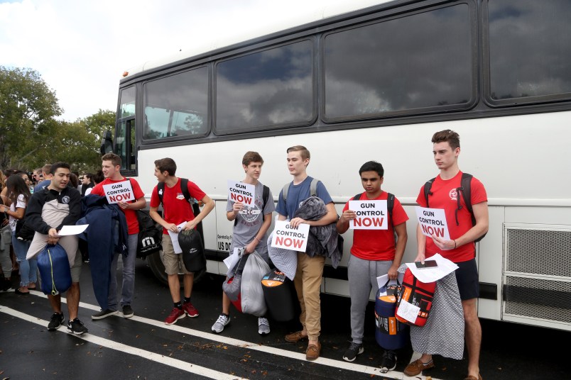 Students from Marjory Stoneman Douglas High School get ready to board a bus for a trip to Tallahassee, Fla. on Tuesday, Feb. 20, 2018 to talk with lawmakers about the recent rampage at their school and what needs to be done to make sure it doesn't happen again. (Mike Stocker/Sun Sentinel/TNS)