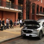 A suspicious vehicle stands with its doors, hood and tailgate open after being inspected in front of the New Executive Office Building, tying up rush hour traffic for blocks near the White House, February 21, 2018 in Washington, DC. The vehicle was later declared safe.