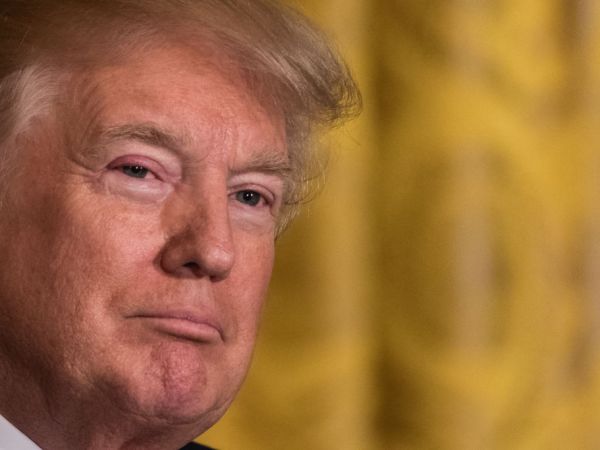 U.S. President Donald Trump listens to Prime Minister Malcolm Turnbull of Australia, during their joint press conference, in the East Room of the White House, on Friday, February 23, 2018. (Photo by Cheriss May/NurPhoto)