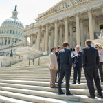 UNITED STATES - AUGUST 02:  Sen. Bob Corker, R-Tenn., talks to some of his interns on the Senate steps of the Capitol after the Senate passed a deal to raise the nation's debt limit and reduce the deficit.  (Photo By Tom Williams/Roll Call)