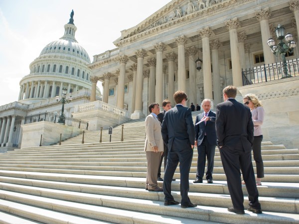 UNITED STATES - AUGUST 02:  Sen. Bob Corker, R-Tenn., talks to some of his interns on the Senate steps of the Capitol after the Senate passed a deal to raise the nation's debt limit and reduce the deficit.  (Photo By Tom Williams/Roll Call)